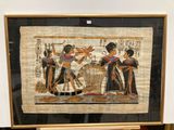 an old picture of a group of egyptian people in a museum
