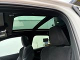 a view of a car ' s interior from the passenger seat