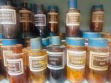 many jars of food that are sitting on a shelf