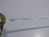 a small piece of paper taped to a metal object