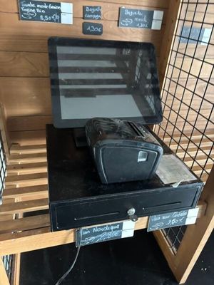 a black suitcase sitting on top of a black counter