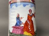 an image of a mug with a painting of a woman and a man on it