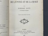 an open book with a black and white image of the title of a poem