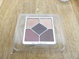 a picture of a box of eye shadow palettes on a table