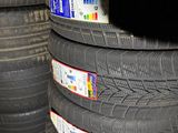 a lot of tires that are stacked on top of each other