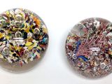 two donuts that are covered with different types of confetti