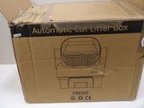 an open box with a picture of a car in it on a table