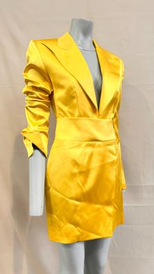 yellow satin blazer and skirt suit with matching belt