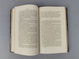 an open book with a picture of a cat on it
