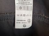 a close up of a label on the back of a jacket