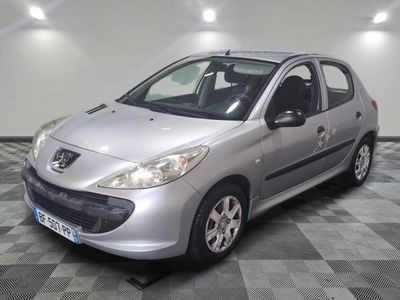 a picture of a silver car parked in a garage