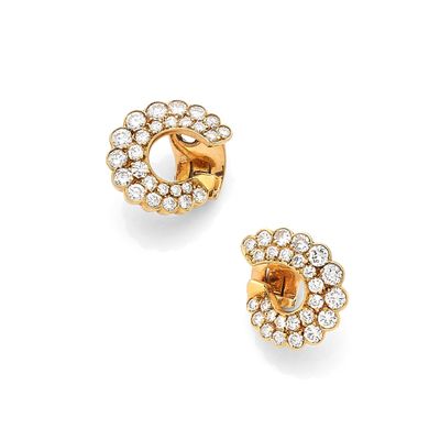 a pair of diamond and eighteen karat gold earrings