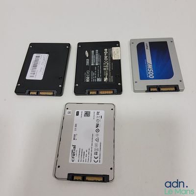 three hard drives sitting next to each other on a table