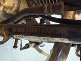 a close up of a motorcycle that has a sticker on it