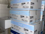 a stack of boxes stacked on top of each other in a room