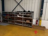 a garage with a lot of tools on the shelves