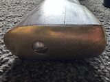 a small metal object on the carpet of a living room