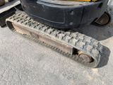 an image of a close up of a tractor track