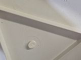 a close up of a microwave on a white counter