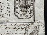 a close up of a piece of paper with a stamp on it
