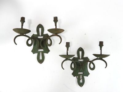 pair of antique wall sconces in the shape of a horse head