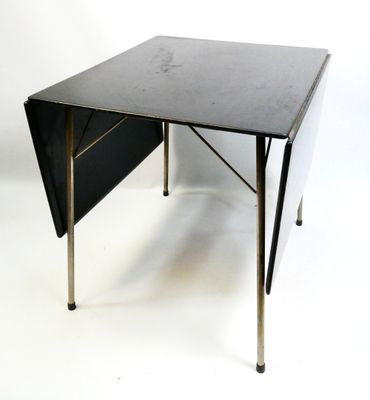 a black table with a folding top on a white background