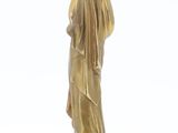 bronze statue of a woman holding a trumpet on a marble base