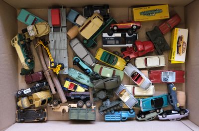 a box full of toy cars and trucks in it