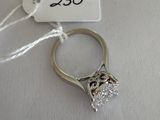 an image of a diamond ring with a price tag attached to it