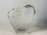 a clear glass vase with a black and white design on it