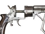 a gun that is attached to the handle of a gun