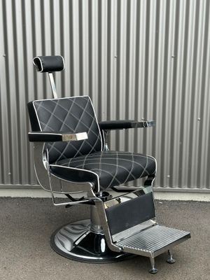 ​Fauteuil de barbier à structure en métal chromé, base circu…