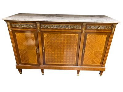 a sideboard with a marble top and wooden doors
