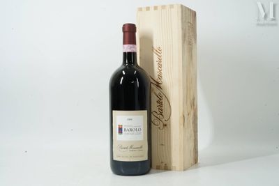 a bottle of wine sitting next to a wooden box
