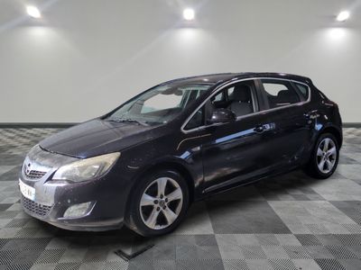 a picture of a car that is parked in a garage