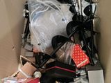a cardboard box filled with assorted items in it