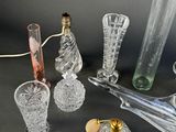 a lot of glass items that are on the table