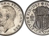 Gros plan sur une pièce de monnaie représentant un homme.