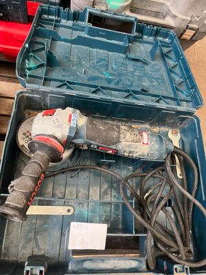 a tool in a case that is sitting on the floor