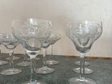 a lot of empty wine glasses sitting on a table