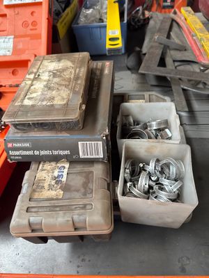 a lot of tools sitting on a table in a garage
