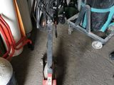 an image of a floor polisher in a garage