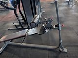 a machine that is sitting on the floor in the gym
