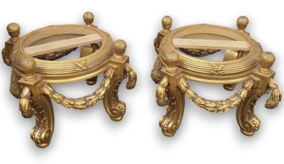 pair of antique brass candlesticks with a mirror on each side