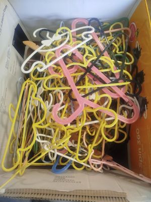 a box with a bunch of paper clips in it