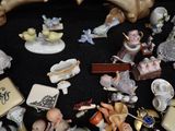 a lot of figurines that are on a table
