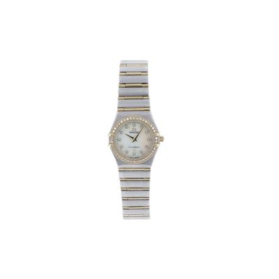 a close up of a watch on a white background with a white background