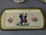 a plate with a picture of a man and a woman on it