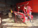 a tractor that is sitting in the dirt
