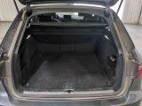 a trunk of a car with the back door open
